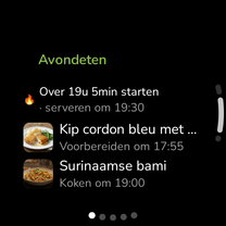 The KiWi meal plan on a round Wear OS watch, showing tonight’s dinner, when to start and who is bringing what